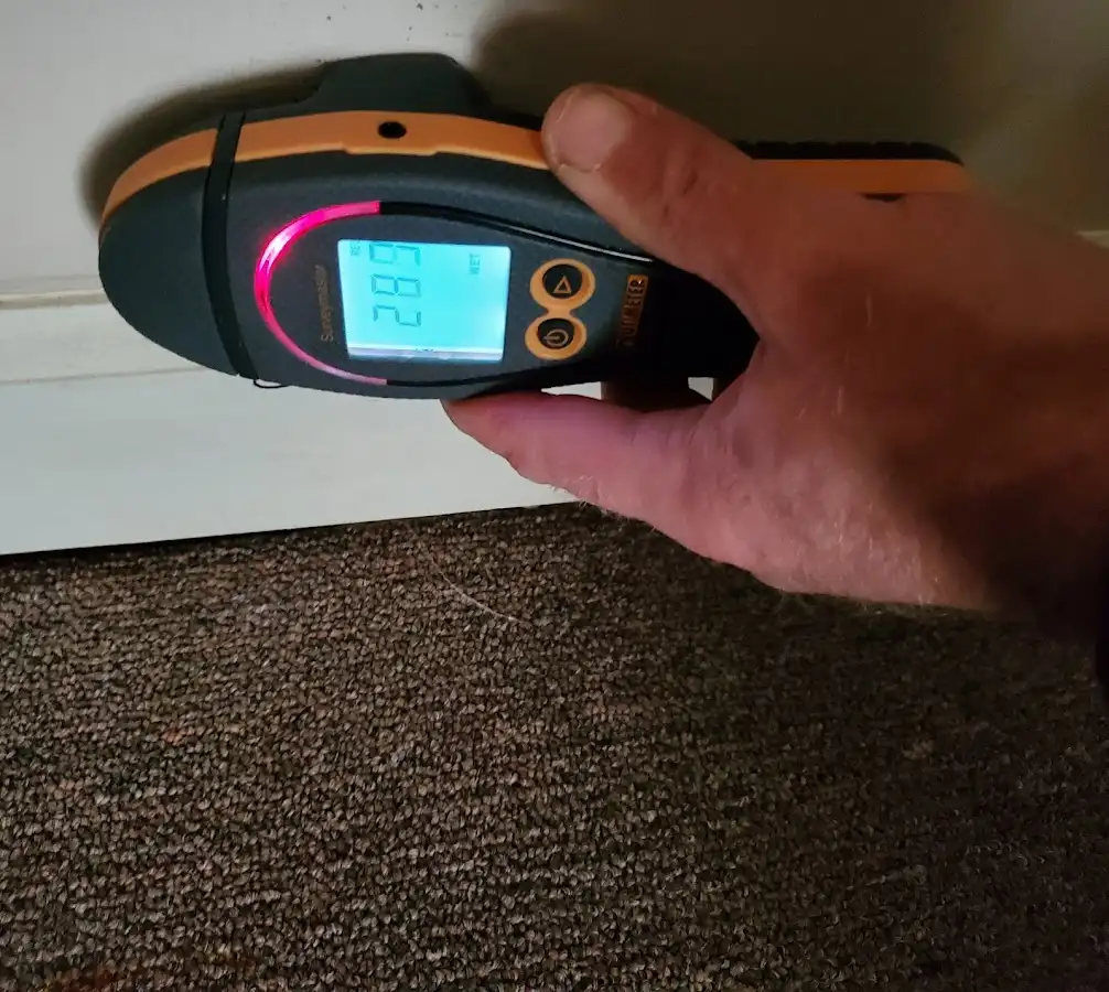Moisture detection at baseboard during Sewage Cleanup & Sanitation in Pound Ridge